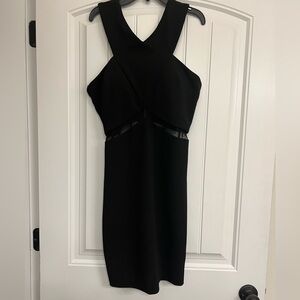 LM collection black cocktail dress. Mesh lining in front and back with zipper